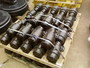 Assorted - excavator/bulldozer undercarriage parts-rollers and chains